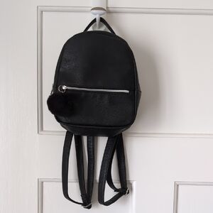 Black H&M Mini Backpack with Pom Pom Accent